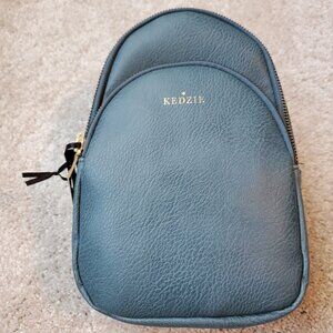 Kedzie Sunset Sling Vegan Leather Bagi in Teal